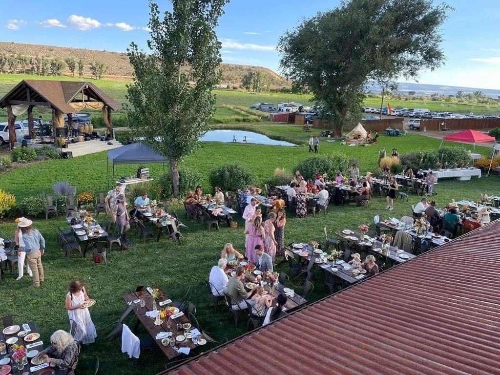 Photo of ZenZen Upper Lawn with tables set for a large dinner